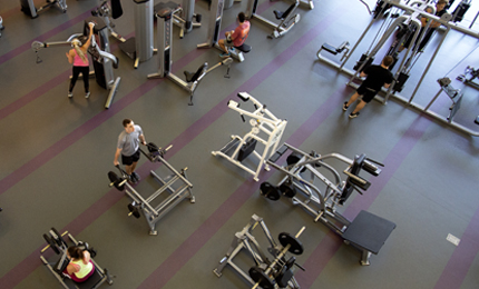 Students working out in the rec center weight room